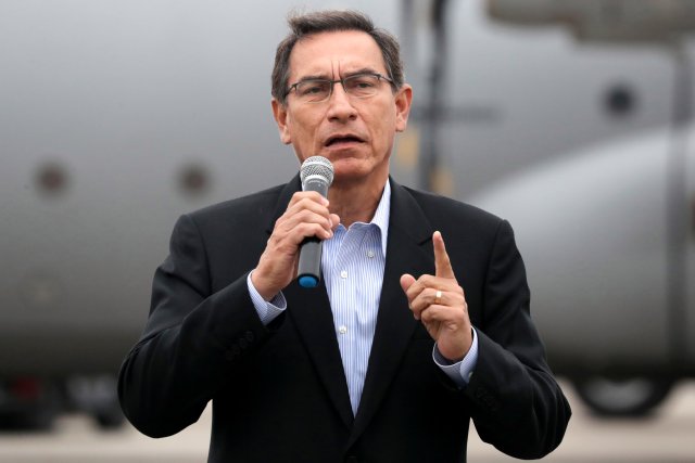 Peru's President Martin Vizcarra speaks to the media prior a deportation of Venezuelan migrants, after they were accused of concealing that they had criminal records, according to Peru's Interior Ministry, in Lima